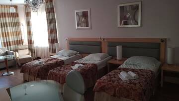 Фото номера Четырехместный номер Мотели Motel Domek Myśliwski г. Bobolice 5
